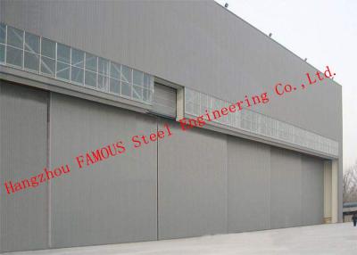 China Hydraulic / Electrical Aircraft Hanger Door And Aviation Building Airplane Bifold Doors Vertical Lifting Systems for sale