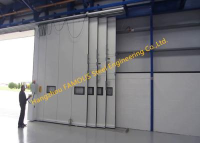 China Multi Sector Structural Folded Hinged Sliding Doors Bottom Rolling Hangar Door Smart Track Design for sale