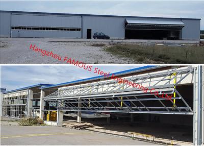 China Vertical Bi Fold Hangar Door Solution Light Steel Single Panel Hydraulic Airplane Door System for sale