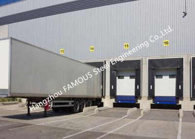 China PVC Fabric Loading Dock Sectional Seal Lifting Industrial Garage Doors With Remote Operations for sale