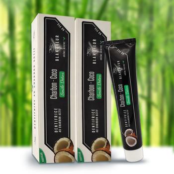China Coco de bambú natural del OEM de la crema dental del carbón de leña del FDA que blanquea la crema dental en venta