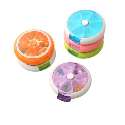 China 7 Cases Round Shape Pill Box With Weekly Pill Organizer Fruit color Pill case for sale