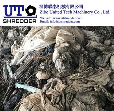China automatic shred machine to oil package size reduction, 2 shaft shredder, two rotors crusher, black sludge bag shredding for sale