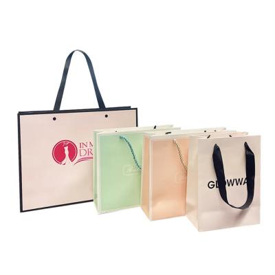 China Washable Paper Tote Bag Making Design Customized Logo Printed Brown Handle for sale