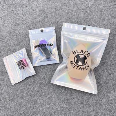 China Mylar Plastic Holographic Bag Manufacturer Zipper Candy Black Holographic Purse Backpack for sale