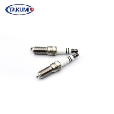 China J Electrode Motorcycle Spark Plugs Multi - Ribs Insulator Nickel Plated Housing for sale