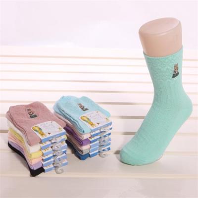 China Cheap mid-calf length socks with cartoon embroiderying logo for women for sale