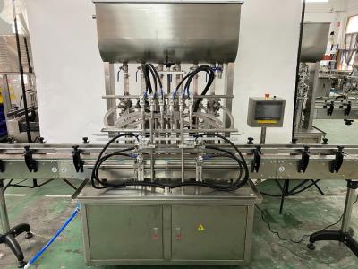 China Automatic 4 Heads Sauce Bottling Machine Ketchup Filling Machine With Feeding Pump for sale