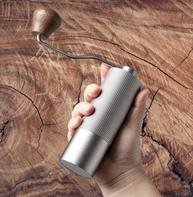 中国 家のエスプレッソのコーヒー豆挽器の手動クランクの小型ハンドルの携帯用ステンレス鋼のぎざぎざ 販売のため