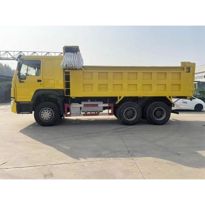 China Howo Used Dump Truck With Crane 6X4 Dumper 12.00R20 zu verkaufen