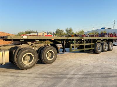 China 3axles Flatbed Truck Semi Trailer 60 Tons 20/40FT Container Shipping for sale
