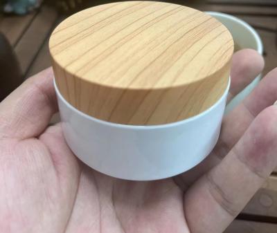 China Plastic Wood Grain Cover 100ml 200ml Cream Jar Bamboo For Cosmetic OEM for sale