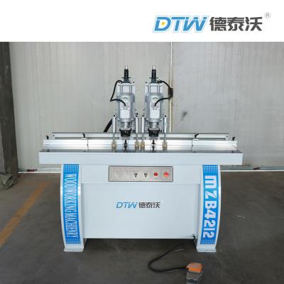 China 1.5kw Double Heads Plywood Drilling Machine Cabinet Door Hinge Drilling Machine for sale
