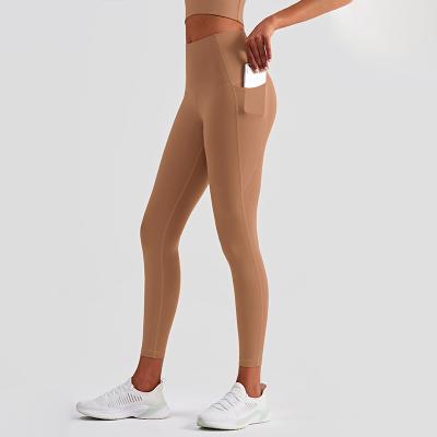 China Naked Felling High Stretchy Women Sports Leggings With Pockets for sale