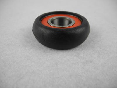 China Black Fiberglass filled Nylon Parts , ylon Injection Moulded Ball bearing Wheel for sale