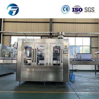 China Carbonated Drink Glass Bottle Filling Machine With Automatic Capping Machine for sale