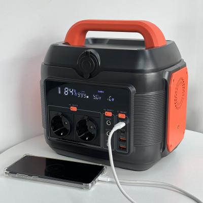 China 600W portable mobile power 6kg orange black outdoor indoor emergency energy storage power 258*212*249mm for sale