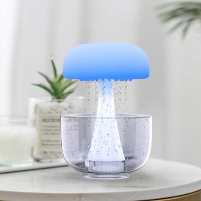China 2023 New Unique Sleeping Relaxing Water Drop Sound Night Light Aromatherapy DIY Customize Detachable Jellyfish Rain Humidifier for sale