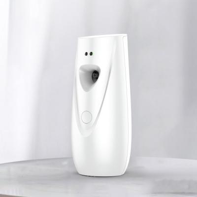China commercial motion sensor spray fragrance diffuser hotel aerosol spray perfume dispenser air freshener for sale
