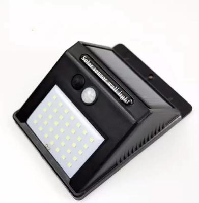 China IP65 LED Solar Powered Motion Sensor Wall Light Outdoor 50000Hrs Corrosion Resistant for sale