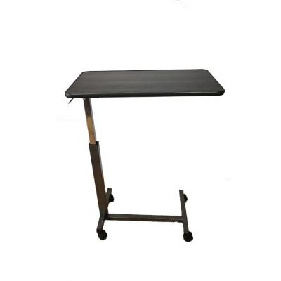 China escritorio discapacitado de Overbed de la altura de los 71.5cm de hospital de la tabla ajustable desmontable de la cama en las ruedas en venta