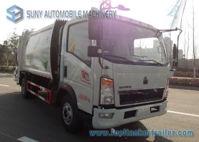China 8000L 8M3 HOWO 4 X 2 Garbage Compactor Truck Q235 Carbon Steel Tank for sale