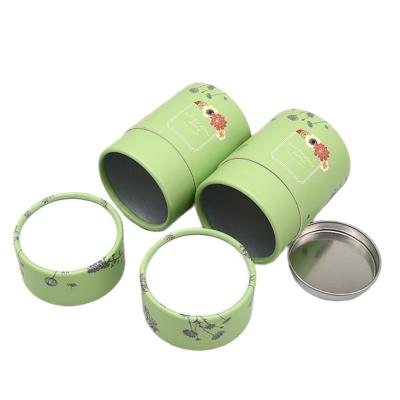 China Cilindro de té de grado alimenticio con tubo de papel de cartón impreso de hojalata para alimentos en polvo en venta
