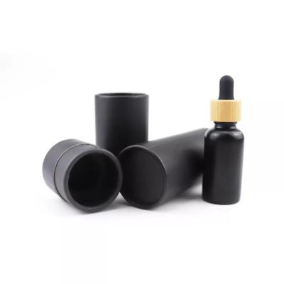 China Black Cardboard Tube Boxes for Essential Oil Dropper Bottles Cosmetic Packaging Tubes for sale