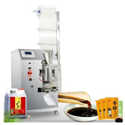 China New Design 3 side Seal Small Vertical packaging machine Automatic Pure liquid Juice Sauce Pouch Packing Machine for sale