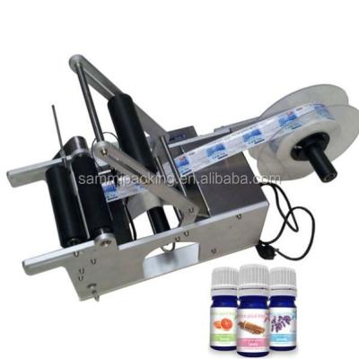 China Semi Automatic Packaging Labeling Machine , Small Bottle Labeler For Round Bottles for sale