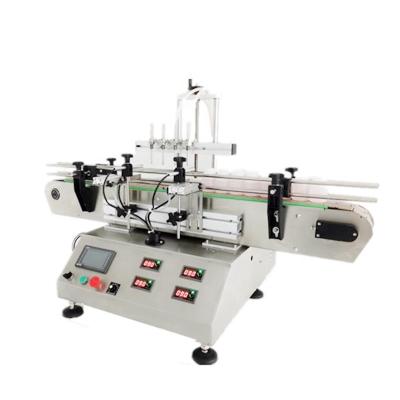 China Automatic Table Top Perfume Small Bottle Filling Machine Cosmetic Jar Liquid Filling Capping And Labeling Machine à venda