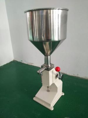 China Hand Operated Filling Machine Manual Cosmetic Paste Sausage Cream Liquid Filling Machine en venta