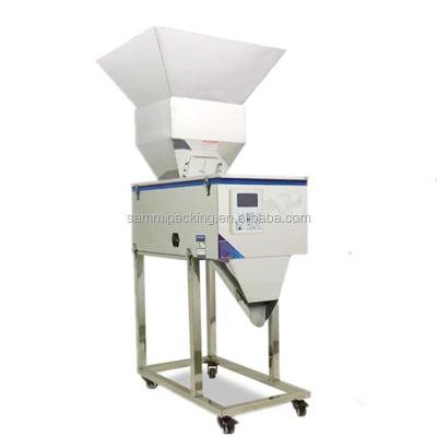China Máquina de pesaje de té con vibración, máquina de llenado de polvo semiautomática para bolsas de té en venta