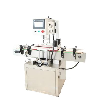 China High Speed Automatic Bottle Capping Machine For Juice Bottle Pump Head Cover for sale