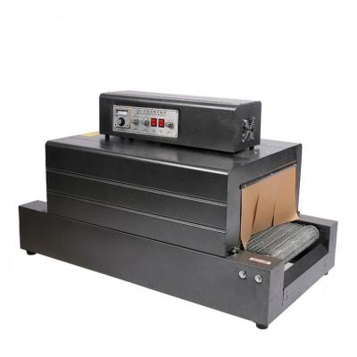 China Pvc Film Heat Tunnel Shrink Packing Machine For Books Bottles Cartons for sale