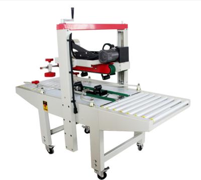 China Fxj-6050 Semi Automatic Tape Carton Box Sealer Box Case Sealer Taping Sealing Machine à venda