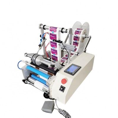 China Semi-Automatic Adhesive Sticker Labeling Machine For Round Bottles for sale