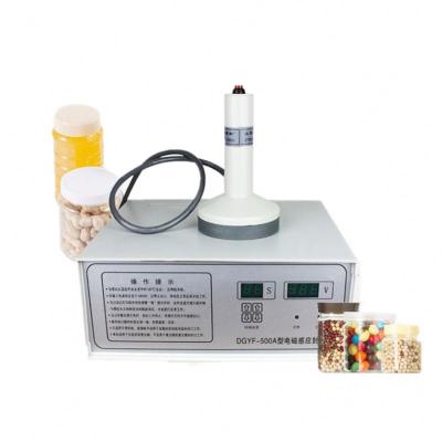 중국 DGYF-500A 인덕션 필름 밀폐 기계 화장품 의료 병 유리 병 판매용