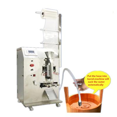 China Low Cost Automatic Ice Lolly Pop Sachet Filling Sealing Packing Machine For Ice Candy Popsicle Liquid Packaging Machine en venta