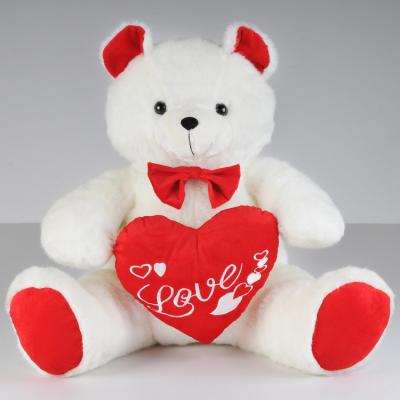 China Fashion Valentines Day Stuffed Toys Teddy Bear With Red Heart Push Celebrating for sale