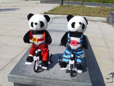China 100% PP Cotton Musical Plush Toys , Electronic Bicycle Animal Panda Soft Toy for sale
