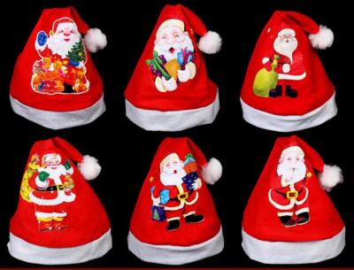 China Red Christmas Hat For Gift Plush Hat  For Christmas Party,Printing Santa Claus for sale