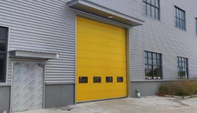 China Automatic Insulated Sectional Doors sandwich Industrial Factory Door Customized for sale