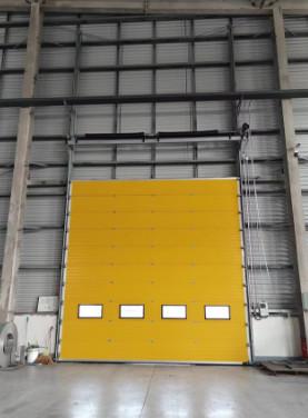 China Wind Resistant Sectional Industrial Door Heat Insulating For Factory And Hangar for sale