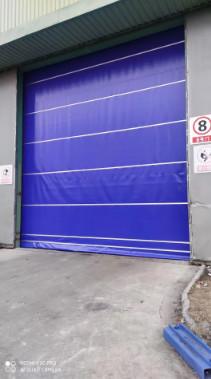 China Blue Industrial Fabric Roll Up Doors Security Protection Fast Stacking Doors for sale