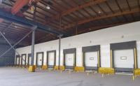 Quality Insulated Sectional Doors can be interlocked with loading and unloading platform for sale