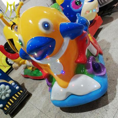 China Hansel  cheap fiber glass kiddie rides amusament coin kiddie rides dolphin for sale