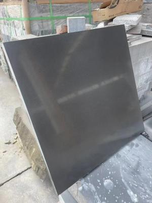 China Honed Finish Black Sandstone Tiles 18mm Sandstone Wall Tile Wear Resistance for sale