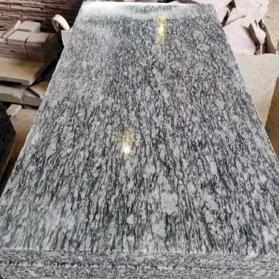 中国 スプレー ホワイトシー・ウェーブ フラワー グラニット墓石板 グラニット記念石板 OEM 販売のため