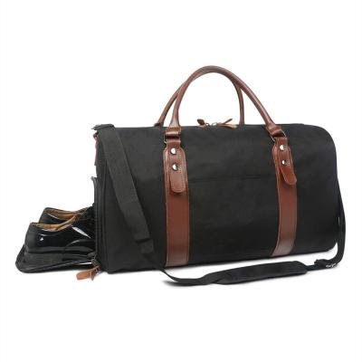 中国 21X5.1X12インチ旅行ダッフル バッグ、夜通しの黒く耐久の完全な週末袋 販売のため
